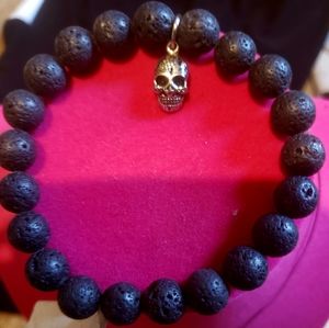 Brand new unisex bracelet with dangling skull